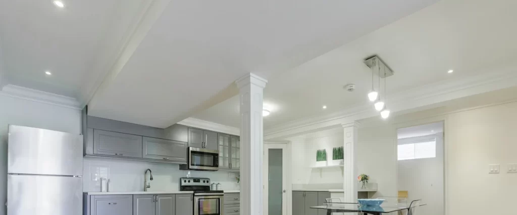 A sophisticated room design demonstrating how to layer ambient, task, and accent lighting for depth.