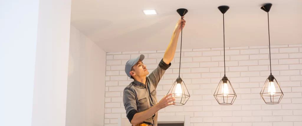 A professional basement lighting installation showing recessed LED fixtures in a finished ceiling.
